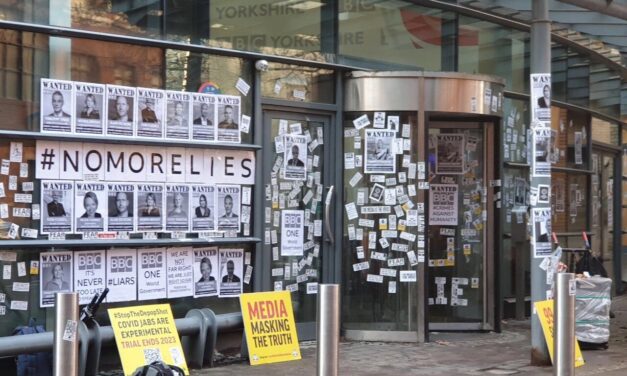 “BBC is the Virus” – At Least 6 BBC Buildings Across UK Covered with Photos of People Who Died from COVID Vaccine (VIDEO)